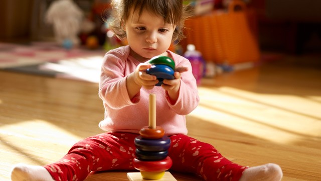 PHOTO: Baby plays with toy