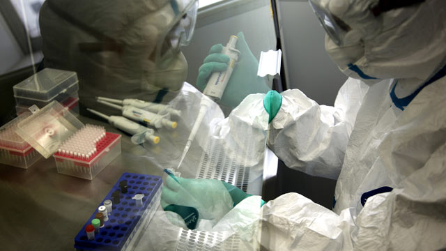 PHOTO: A technician deals with test reagents for H7N9 bird flu virus at the Quzhou Center for Disease Control (CDC), April 4, 2013, in Quzhou, China.