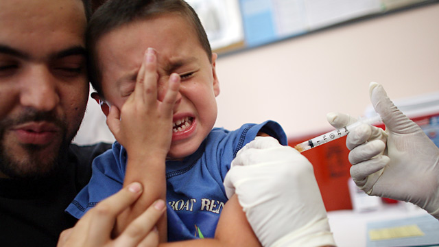 PHOTO: Child being vaccinated