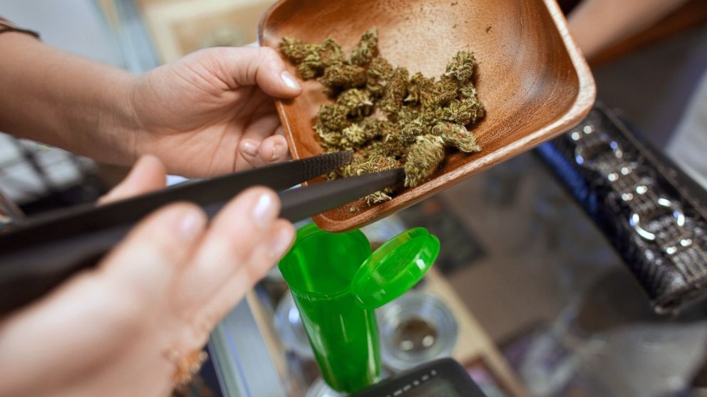 PHOTO: A Highland Health employee dispenses medical marijuana in Denver, in this Nov. 4, 2009 photo.