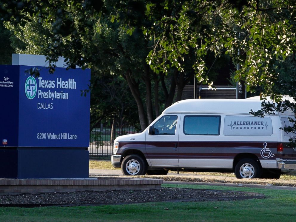 PHOTO: A medical transport van moves past Texas Health Presbyterian Hospital Dallas where a patient has been diagnosed with the Ebola virus, Sept. 30, 2014 in Dallas, Texas.
