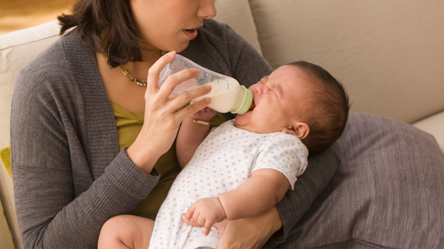 PHOTO: Mother feeding baby