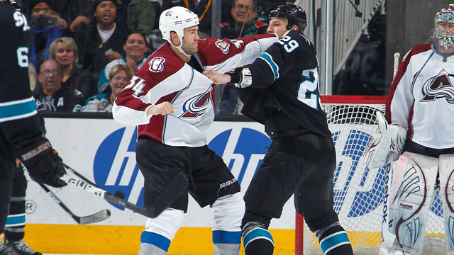 PHOTO: Ryane Clowe #29 of the San Jose Sharks fights Daniel Winnik #34 of the Colorado Avalanche at HP Pavilion, San Jose, California, Dec. 15, 2011.