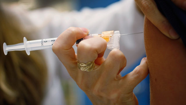 PHOTO: An HPV vaccination is administered in this September 21, 2011 file photo. A study found the vaccine may offer additional prevention benefits.