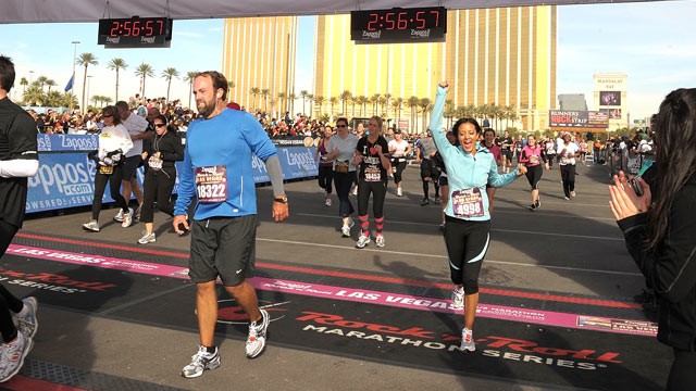 PHOTO: Runners cross the finish line, during the Las Vegas Marathon and Half-Marathon, in this Dec. 5, 2010 file photo, in Las Vegas, Nevada.