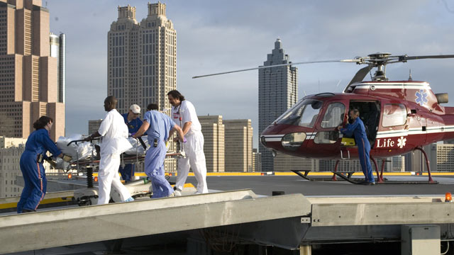 PHOTO: A man that was injured in a car accident arriving by helicopter and rushed to the trauma room for treatment, Grady memorial hospital on July 30, 2006 in Atlanta, Georgia.