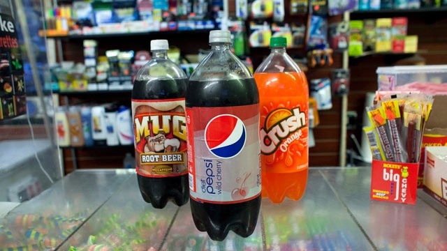 PHOTO: Large soda bottles for sale at convenience store in Chinatown, March 11, 2013, in New York. A New York state judge halted a controversial ban on large sugary drinks in places that serve prepared food that was to take effect, March 12, 2013.