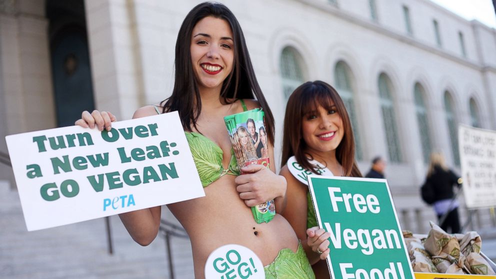 PHOTO: PETA activists promote the "Turn Over A New Leaf: Go Vegan" campaign in front of Los Angeles City Hall, Jan. 7, 2013.
