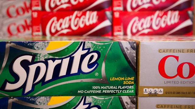 PHOTO: Coca-Cola Co. beverages displayed on shelf in a grocery store in Atlanta, Georgia, U.S., on Feb.7, 2012.