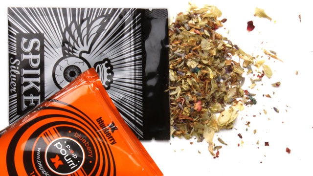 PHOTO: Pouches of dried herbal potpourri being called