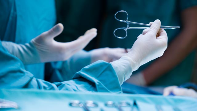 PHOTO: A woman who received black market silicone implants is now in the hospital because the silicone traveled to her lungs.