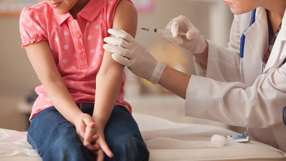 PHOTO: An undated stock photo of a doctor giving a child patient an injection.