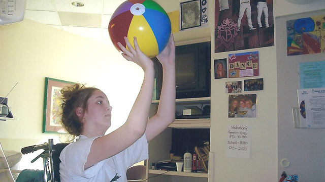 PHOTO: High school basketball star Maggie Meier shot hoops while in a coma from meningitis.