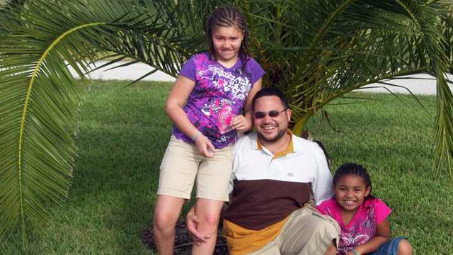 PHOTO: Reynard Zweifel of Kansas City, Mo., with his daughters Amaya, 11, and Leigha, 8.