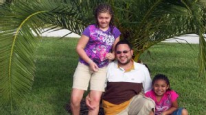PHOTO: Reynard Zweifel of Kansas City, Mo., with his daughters Amaya, 11, and Leigha, 8.