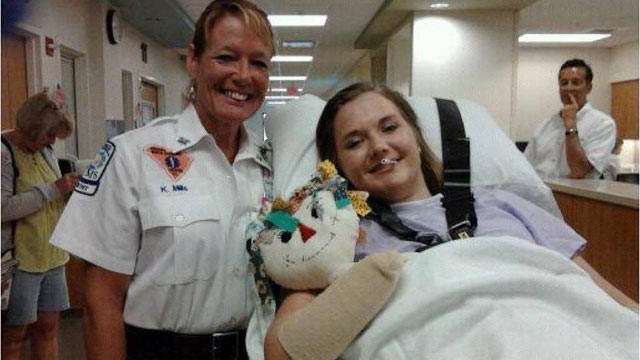 PHOTO: Aimee Copeland, right, is seen on July 2, 2012, leaving the Augusta, Ga., hospital where she spent 49 days recovering from a flesh-eating bacterial infection and the loss of her left leg, right foot and hands.