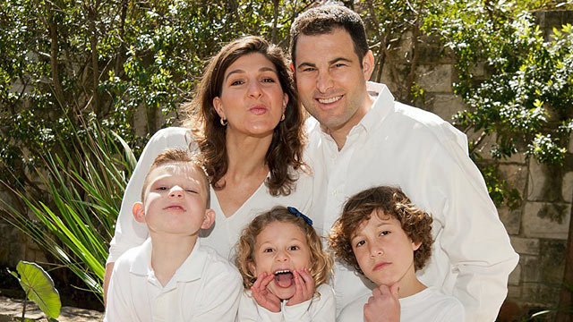 PHOTO: Joshua and Robin Berry with their children (from left) Aaron, Willa and Peter.