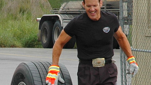 PHOTO: Bob Perry, Trucker Trainer and Rolling Strong Founder
rolls a tire 63 miles in support of driver health and wellness.