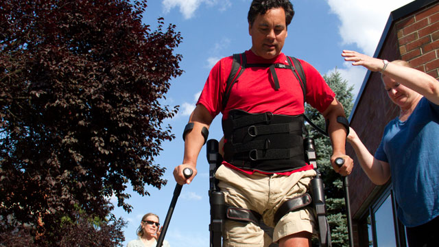 PHOTO: Chris Tagatac using Ekso, a robot that walks for him despite the spinal cord injury that paralyzed him last summer.