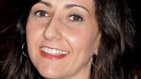 PHOTO Dina Pagnotta had a stroke at age 30 while working out at the gym. Today, she runs marathons and works with young stroke victims.