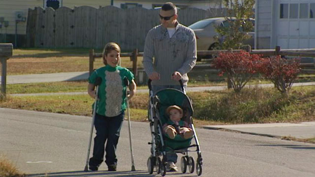 PHOTO: Tiffanie DiDonato, shown here with her husband and baby boy, suffers from a rare form of dwarfism and endured excruciating and controversial series of limb lengthening surgeries.