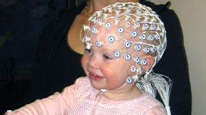 PHOTO A baby gestures in a cognitive neuroscience laboratory at Children?s Hospital Boston.