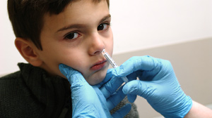 Liam Brogan Nayer (age 6), son of Diane Brogan, is shown getting vaccinated at his yearly check-up at the general pediatrics clinic for the University of ... - ht_kid_vaccine_091006_wmain