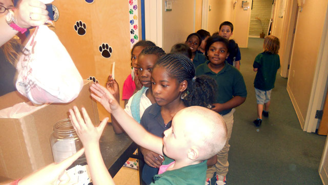 PHOTO: Kids waiting in line for bags of hope