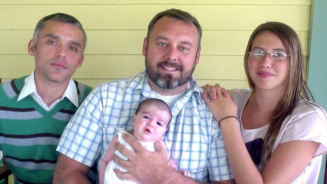 PHOTO: Mitch Stein, 36, with partner Hugo Horta, 33, left, and two daughters Devynn Stein, 15, and Tuolumne Horta-Stein, seven weeks, in Pomona, Calif., where he was fired last August from his coaching job.
