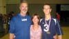 PHOTO:&nbsp;Mary Claire, a 50-year-old senior manager of a global company, is flanked by her husband, at left, Chris and son Christopher.