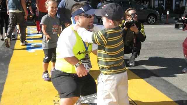 Ht_owen_with_medal_dm_130501_wmain