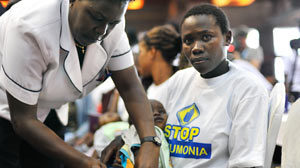 PHOTO A nurse gives one of the first pneumococcal vaccine shots in Africa to a child in Nairobi, Kenya, Feb. 14, 2011.