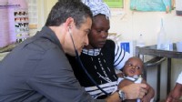 PHOTO: Seen here is Dr. Richard Besser visiting children with pneumonia in Kibera. He spent seven years working on respiratory infections at the Centers for Disease Control and Prevention.