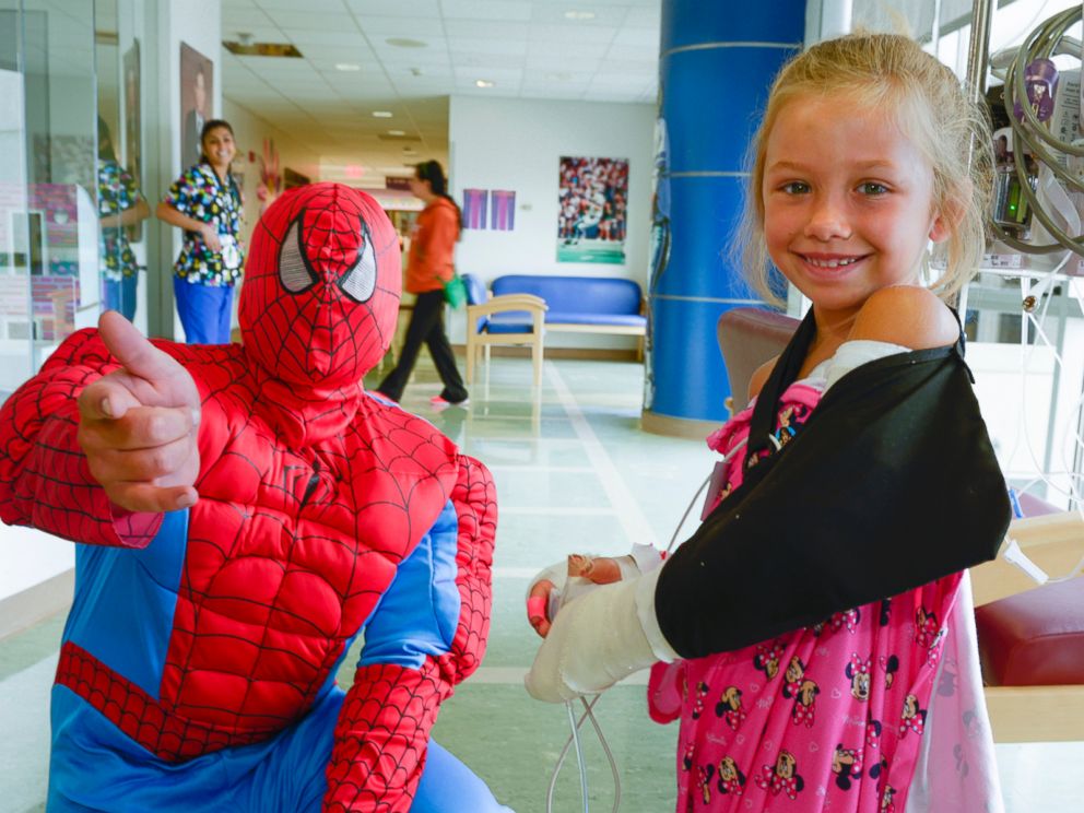 Children went to the hospitals playroom to visit with Spiderman.