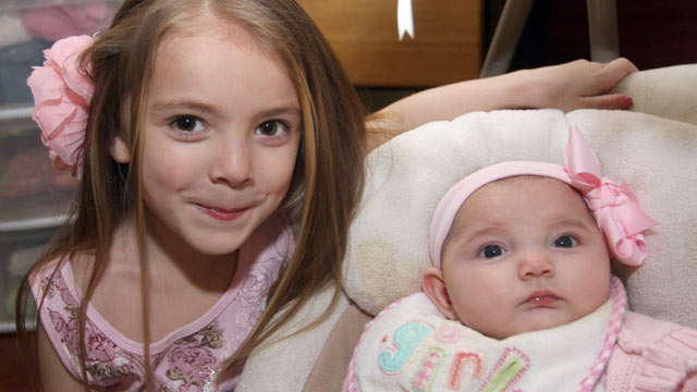 PHOTO: FrankieElizabeth Staiti sits with with her 14-week-old sister Devin Elizabeth Wagner in this undated handout photo.