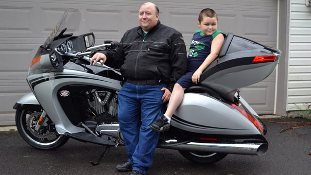 PHOTO: Stay-at-home dad Wayne Moyer, shown with son Matt, says his bike is his "manly escape."