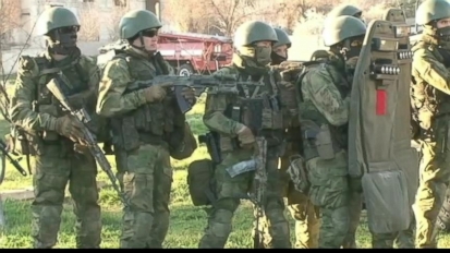 Watch: Armed Russians Forces Take Crimean Airbase from Baton-wielding Ukrainian Soldiers