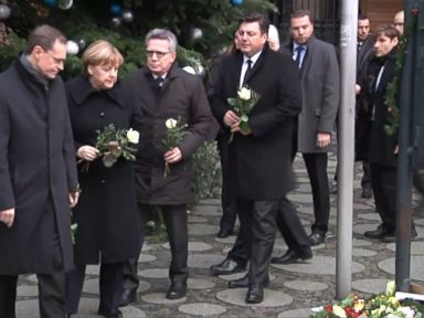 WATCH: German Chancellor Merkel Lays Flowers at Site of Berlin Attack