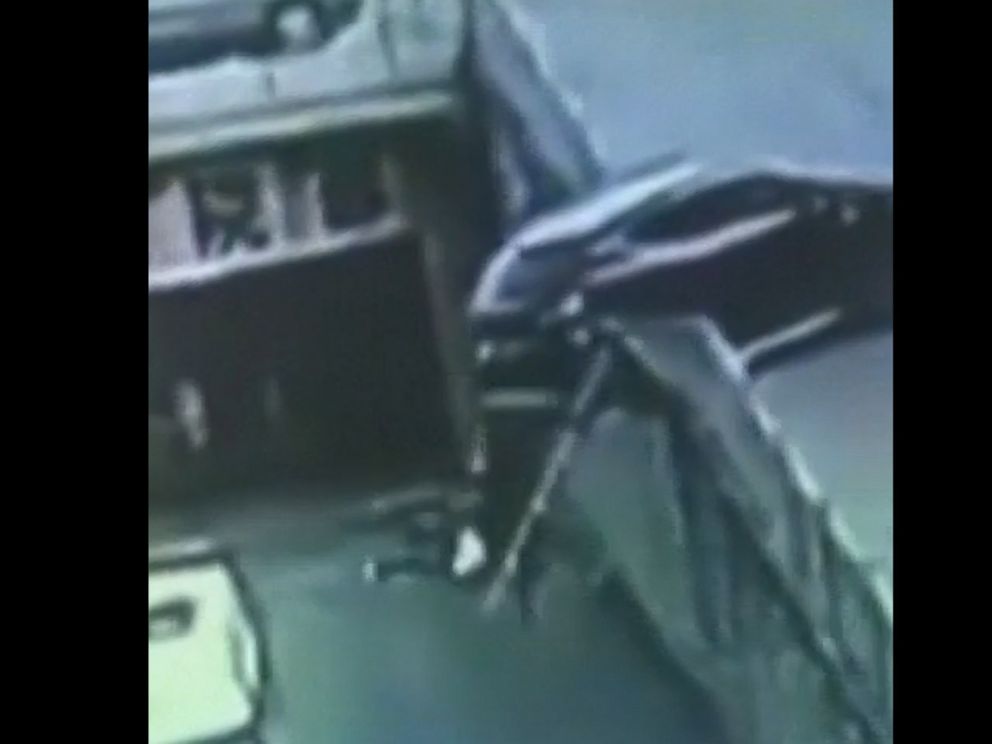 VIDEO: Shocking footage shows mother and child fall several feet off a ramp after being hit by a reversing car. Both are recovering from serious injuries.