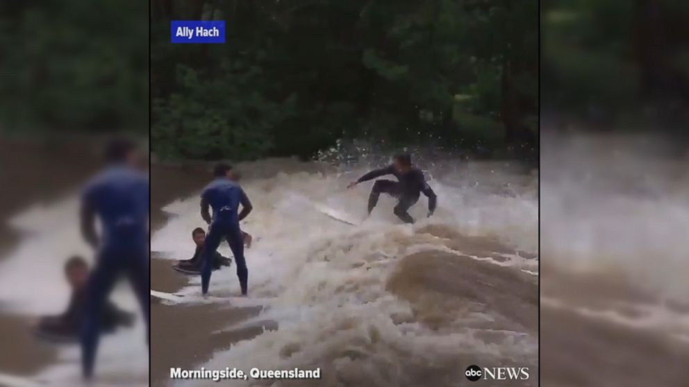 WATCH:  Australians surf and jet ski in raging flood