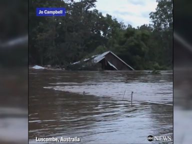WATCH: Building floats away in rushing floodwaters