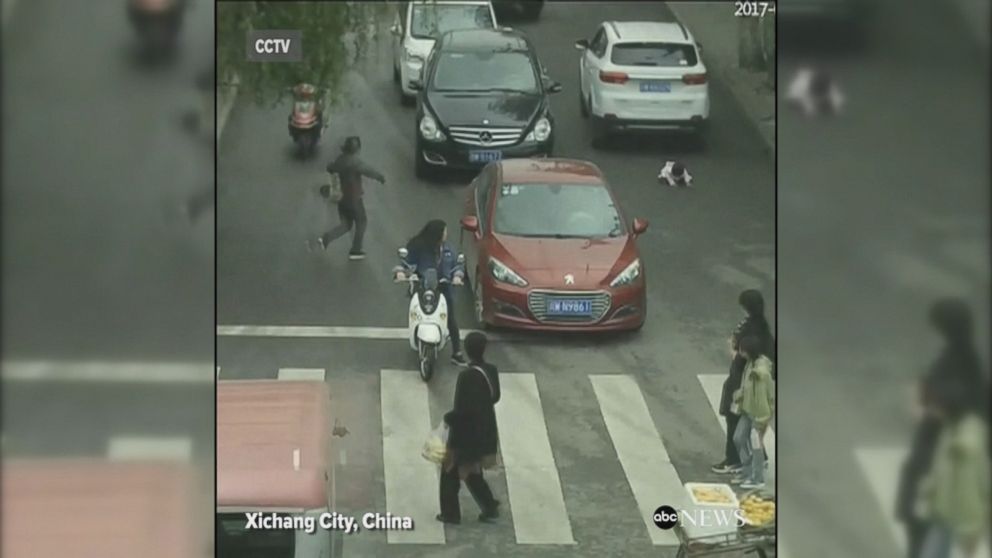 WATCH:  2-year-old survives being run over by 2 cars in China