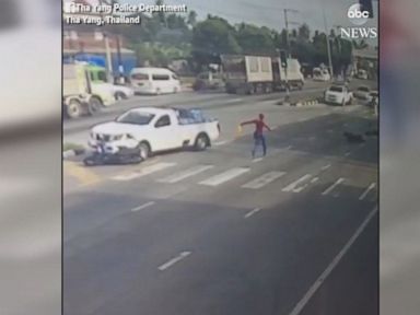 WATCH: Man dressed as Spider-Man helps motorcyclist hit by truck