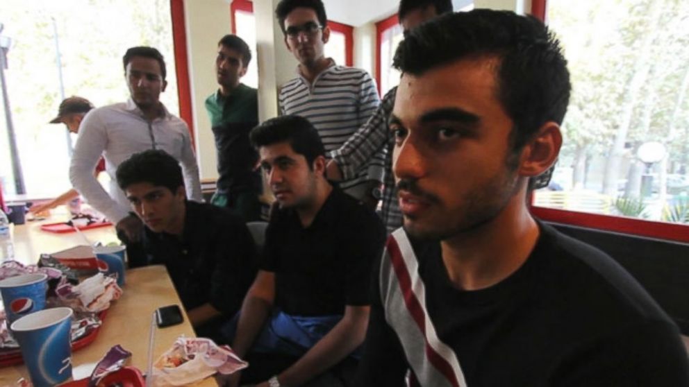 PHOTO: Students from Teheran share their thoughts with Muhammad Lila.