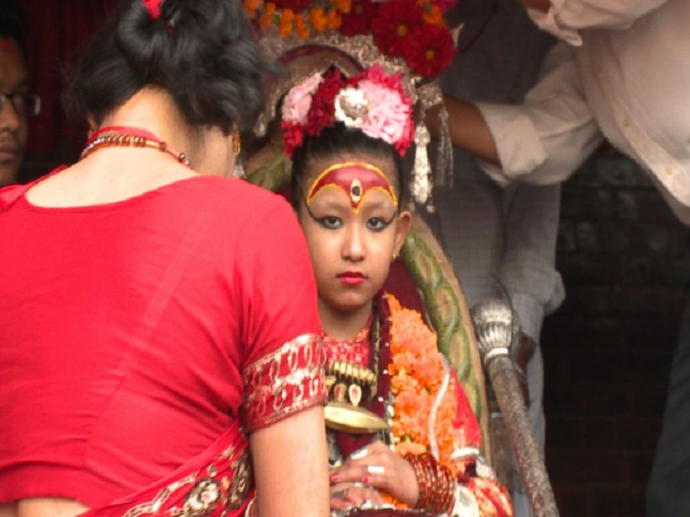 PHOTO: The young girl pictured is a Kumari - a centuries-old tradition of living, breathing child goddesses in Nepal, where its considered good luck to merely lay eyes on her.