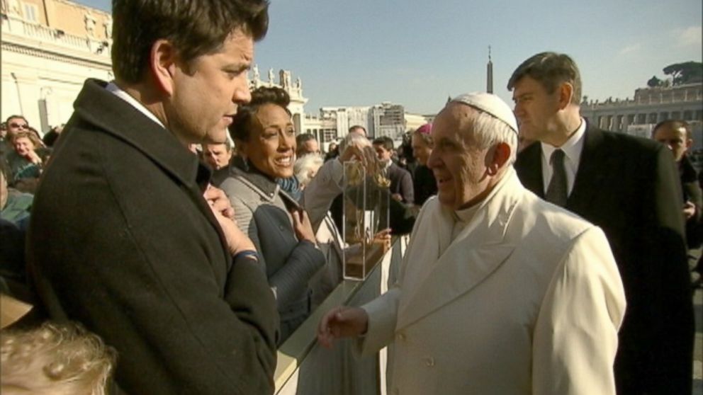 PHOTO: Pope Francis shakes hands with Good Morning Americas Josh Elliott and Robin Roberts, Dec. 18, 2013, in Vatican City.