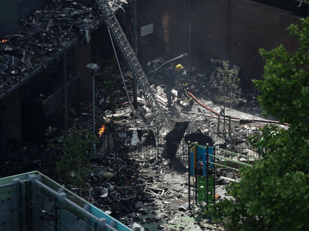 PHOTO: Firefighters battle a massive fire that raged in a high-rise apartment building in London, June 14, 2017.