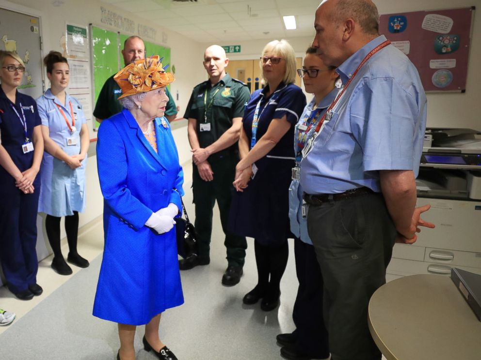 PHOTO:Britains Queen Elizabeth II speaks with hospital personnel as she visits the Royal Manchester Childrens Hospital to meet victims and to thank members of staff who treated them, May 25, 2017.