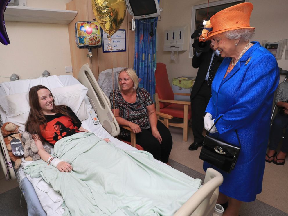 PHOTO: Britains Queen Elizabeth II. right, speaks to Millie Robson, 15, and her mother, Marie, as she visits the Royal Manchester Childrens Hospital in Manchester England, to meet victims and to thank members of staff who treated them, May 25, 2017.
