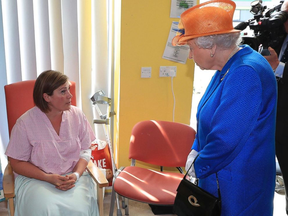 PHOTO: Britains Queen Elizabeth II, right, speaks to Ruth Murrell during the Queens visit to the Royal Manchester Childrens Hospital in Manchester England, to meet victims, May 25, 2017.